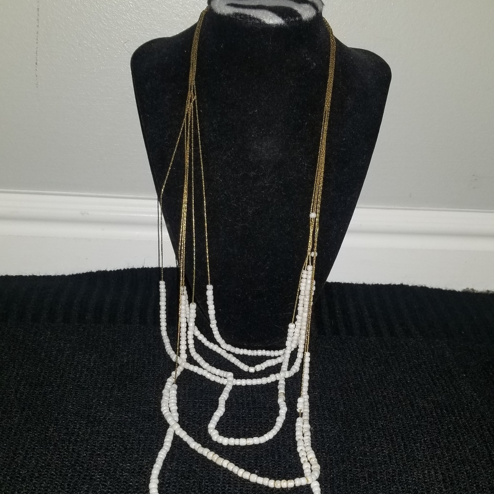 White and gold necklace
